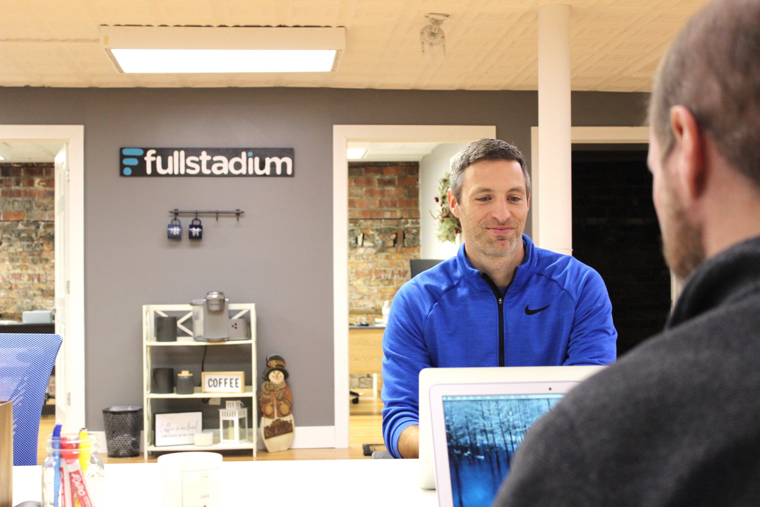 Behind-the-scenes photo from a Full Stadium client interview session