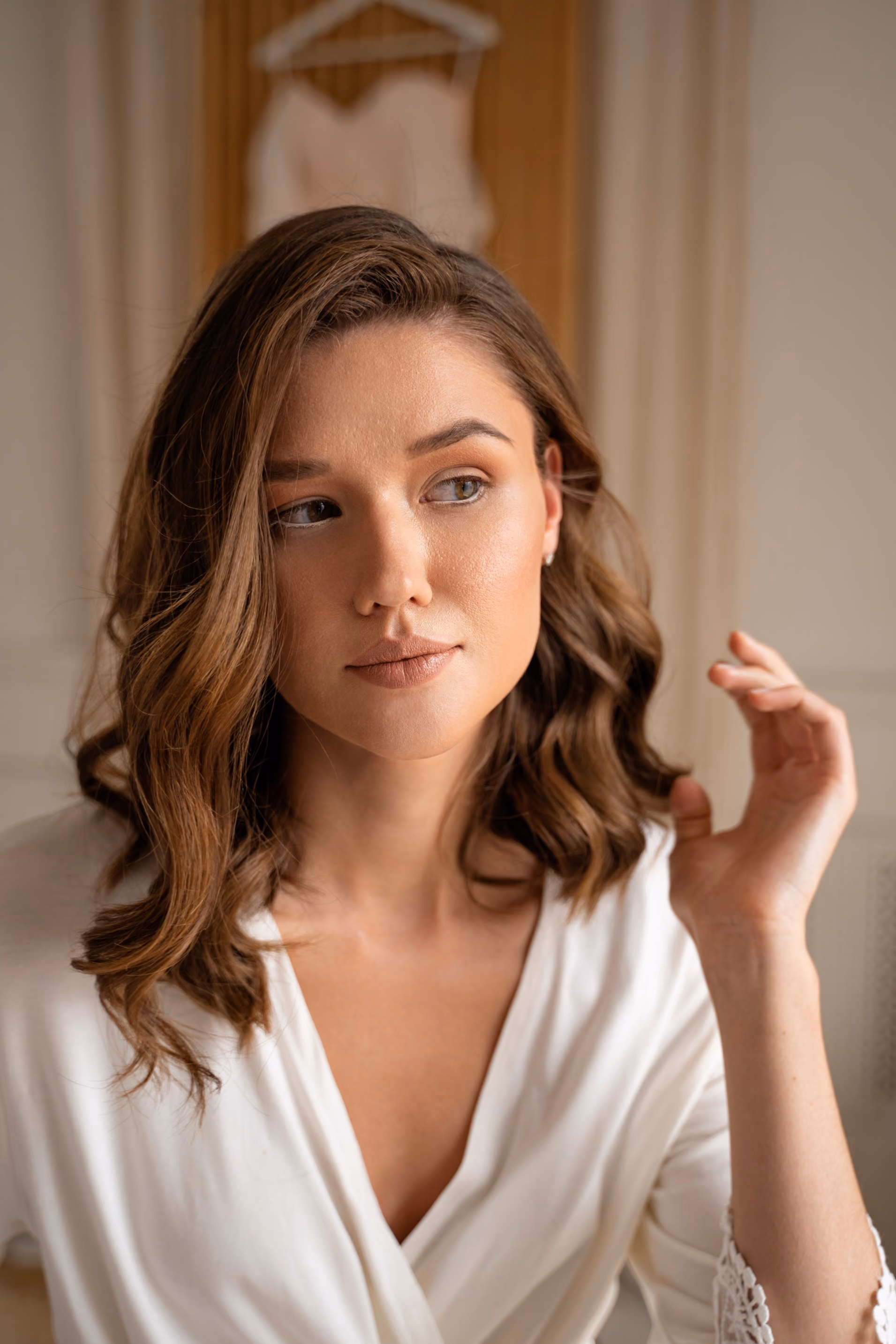 Woman smiling confidently after receiving personalized aesthetic care