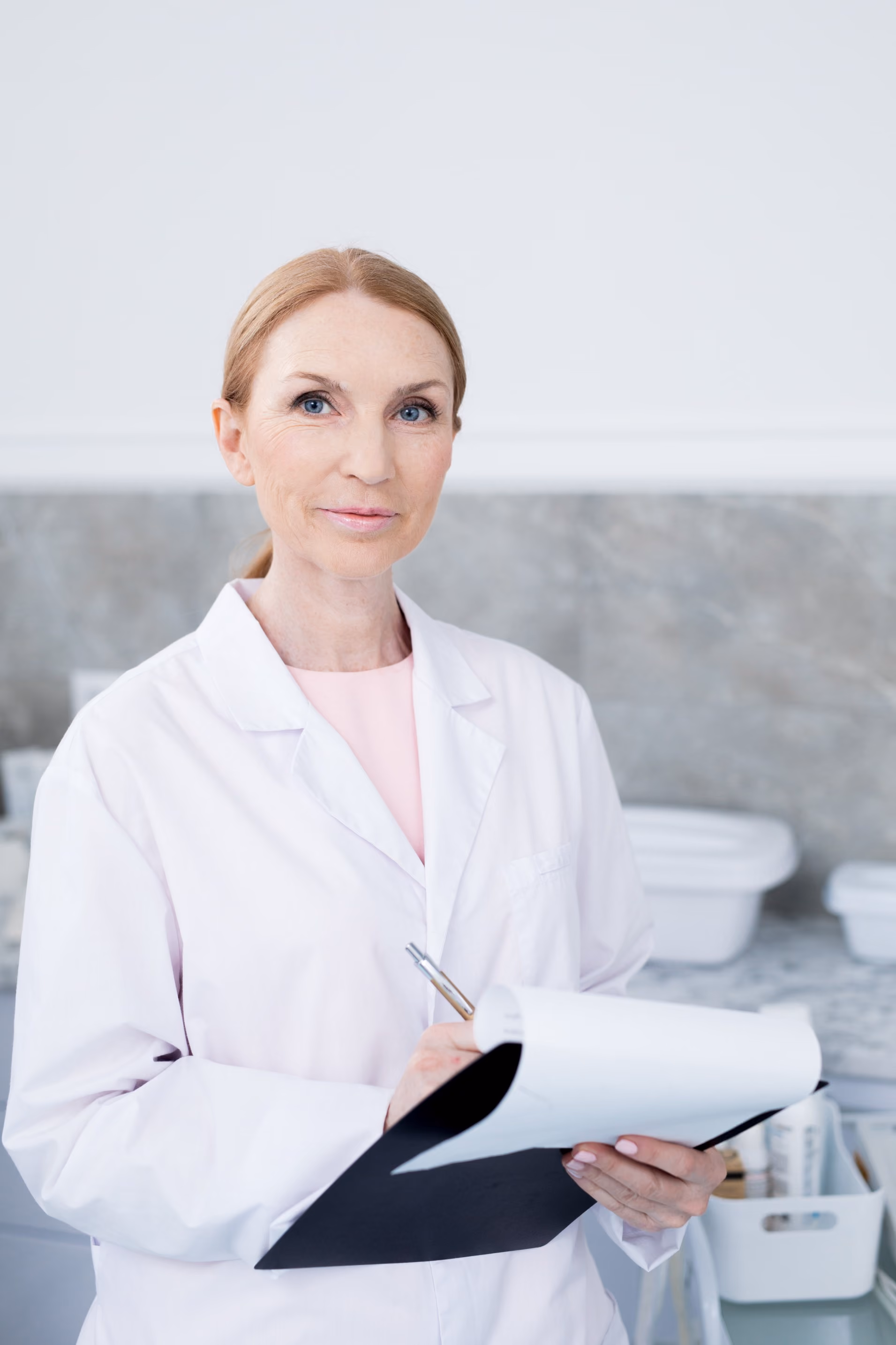 Medical provider in a white coat providing personalized wellness care