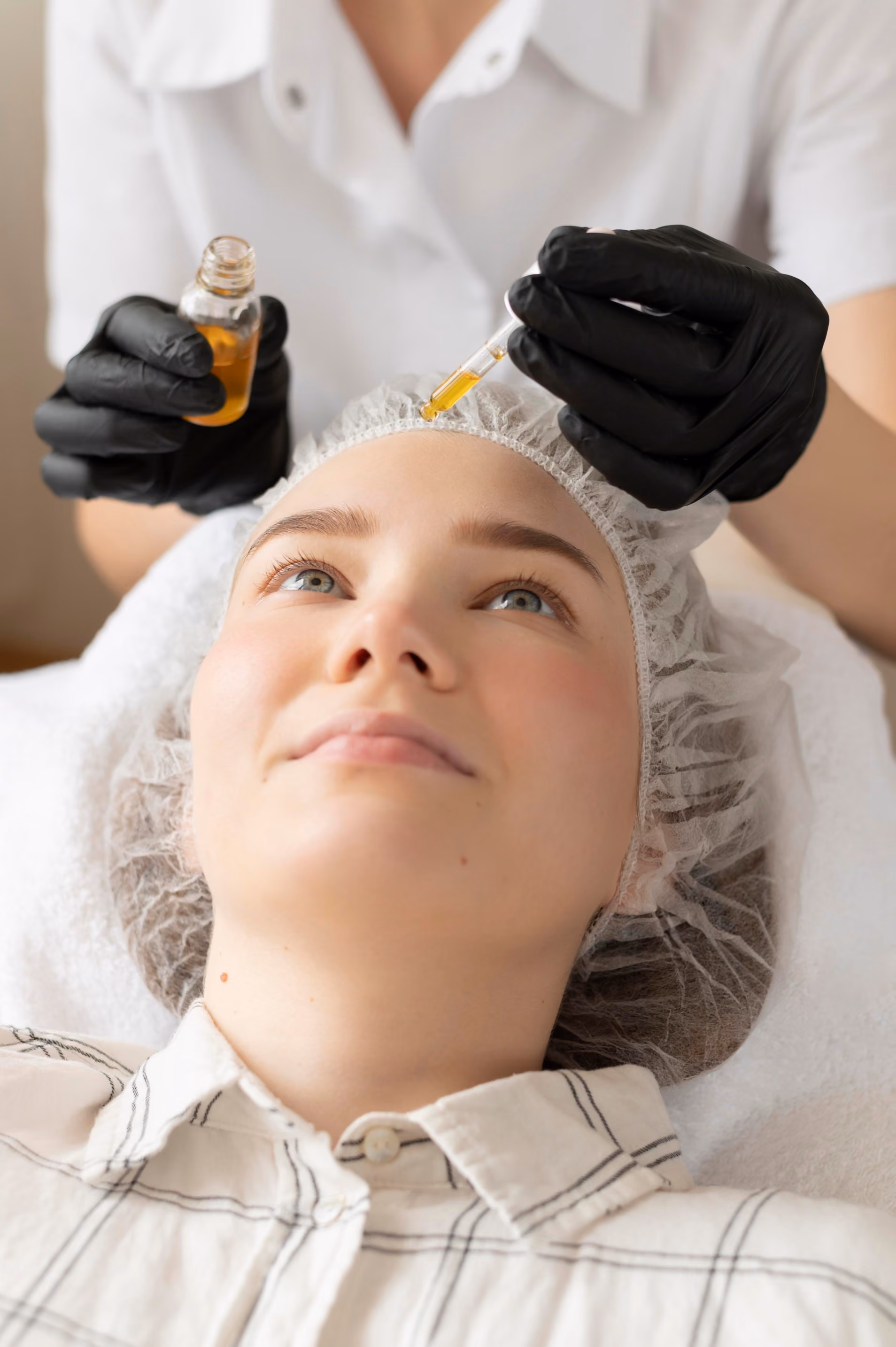 Woman receiving a relaxing facial treatment
