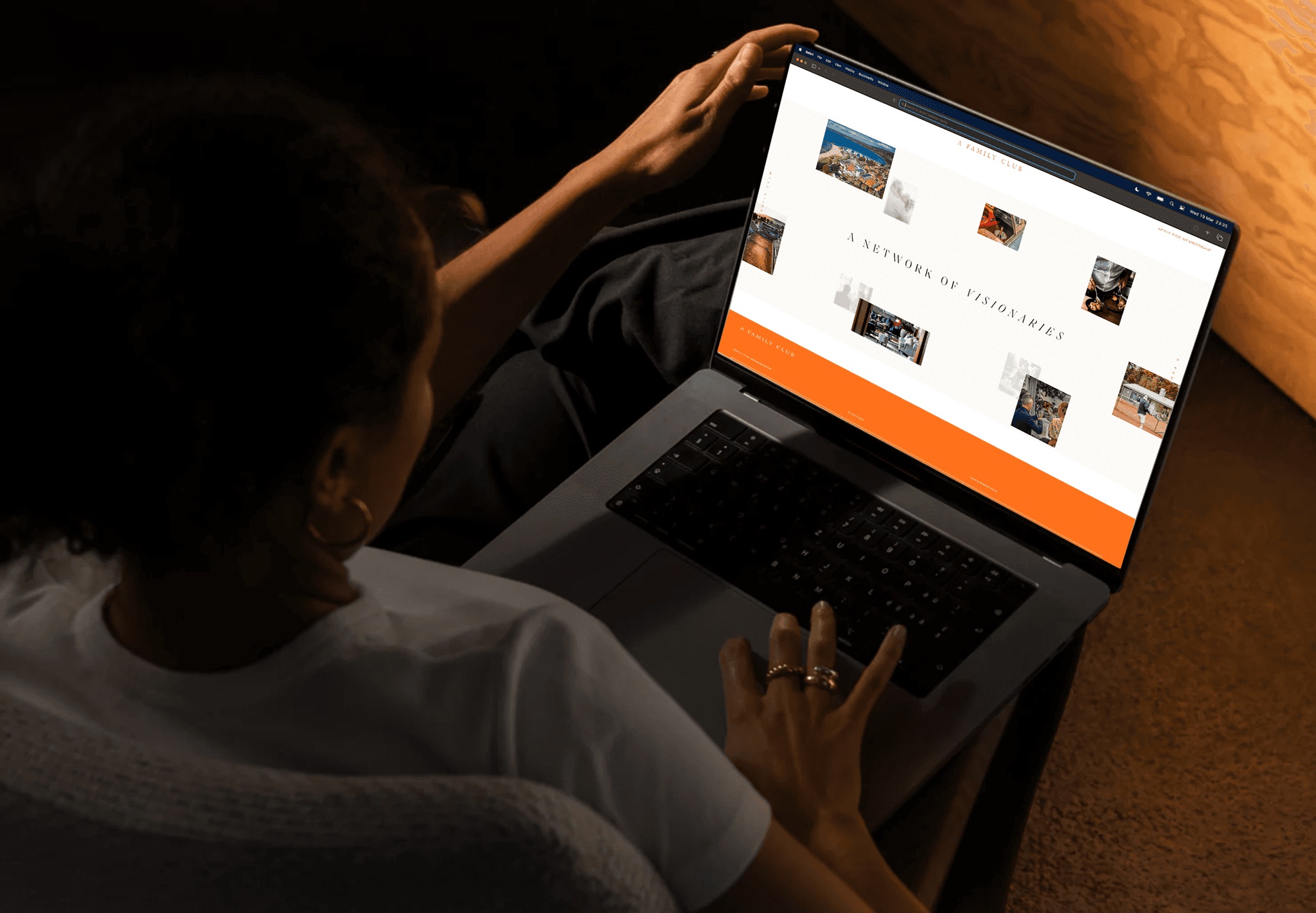 Browsing the A Family Club website on a laptop