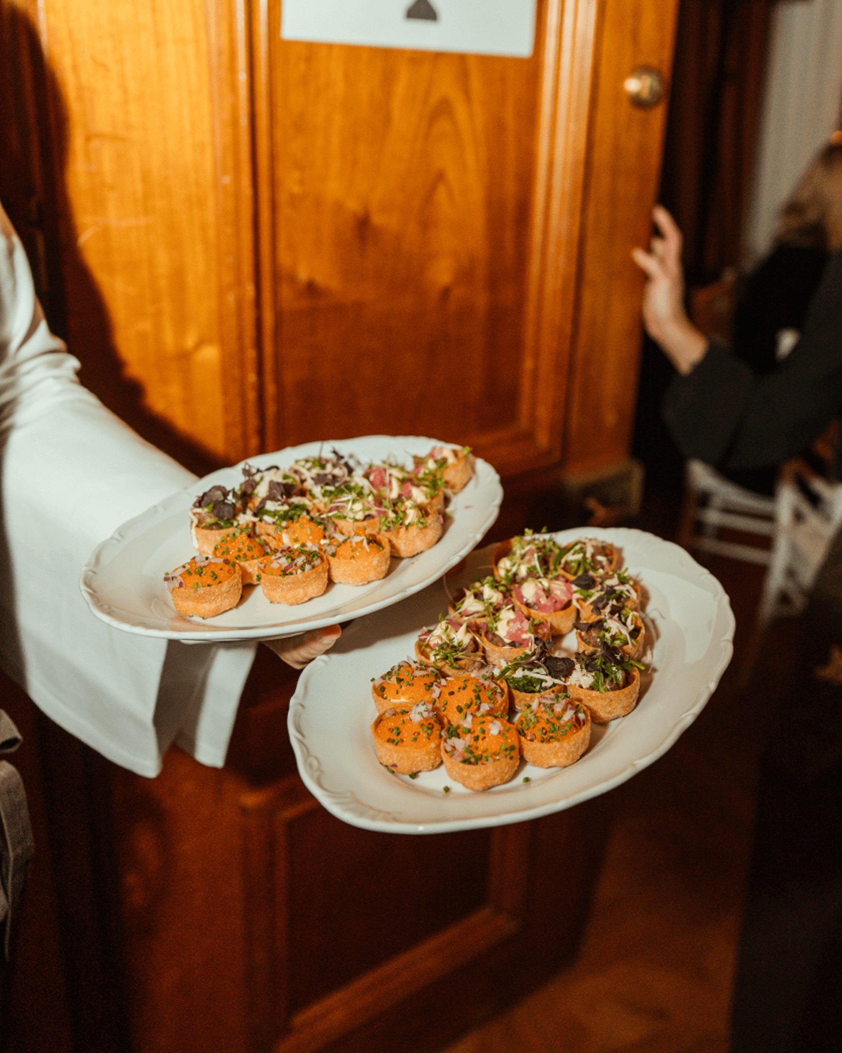 Canapés served on plates at an A Family Club dinner