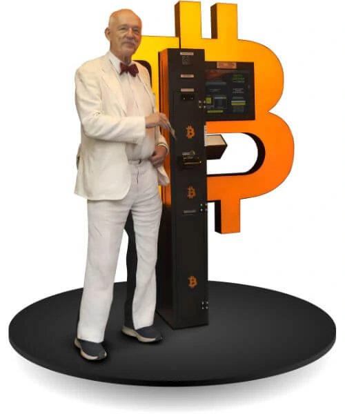 Janusz Korwin-Mikke next to Bitcoin ATM