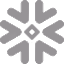 Gray snowflake icon with six symmetrical arms and rounded ends, set on a white background.
