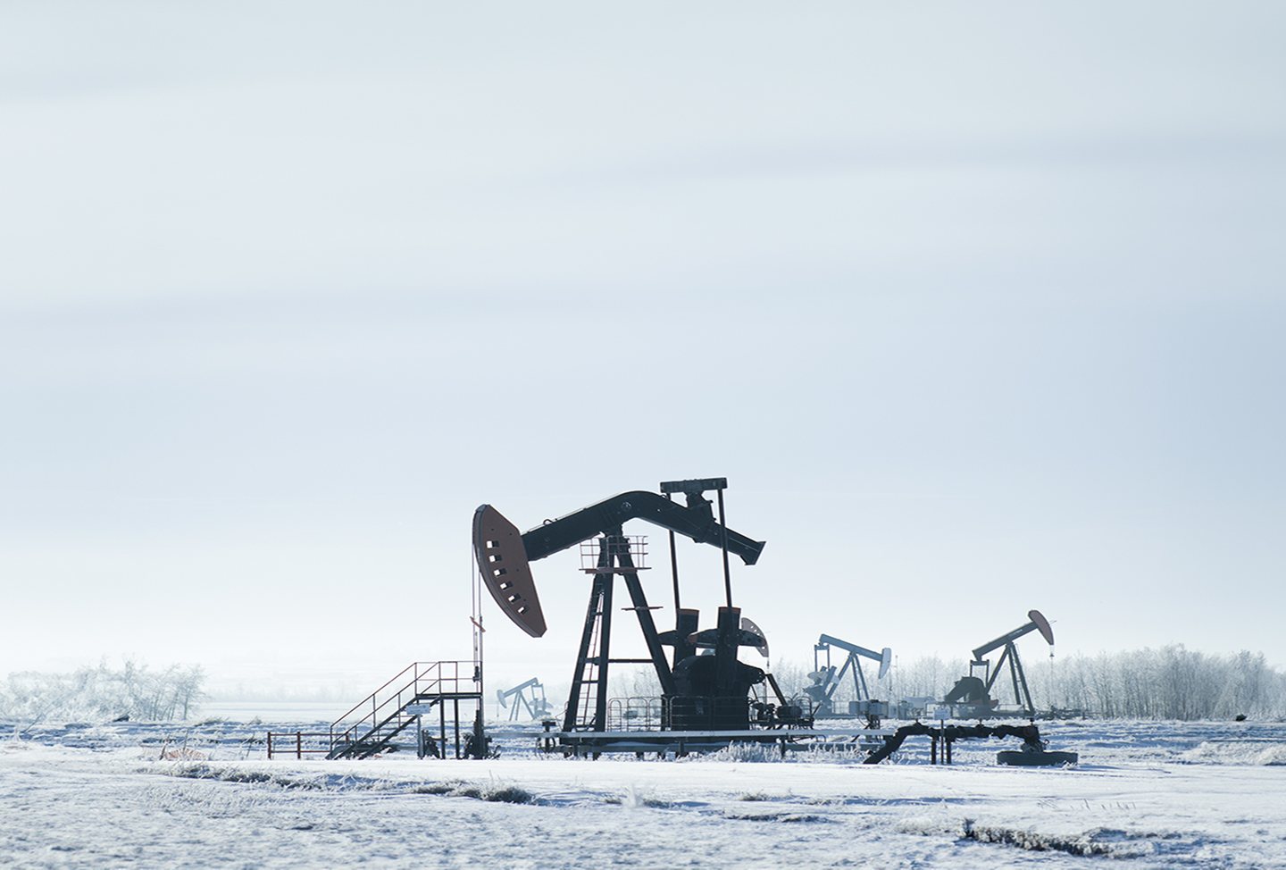 Oil field at dusk