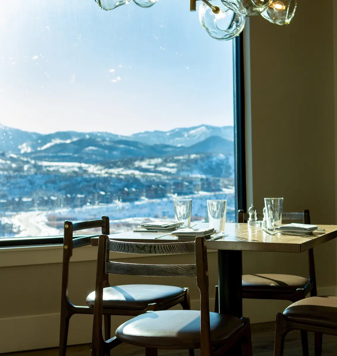 Restaurant table with a snowy mountain view at Black Rock Mountain Resort