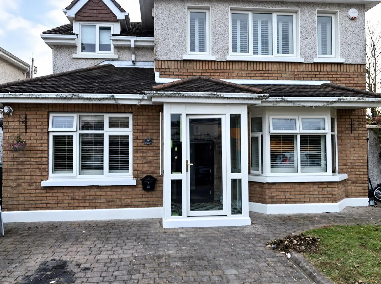 House with white UPVC windows and entrance