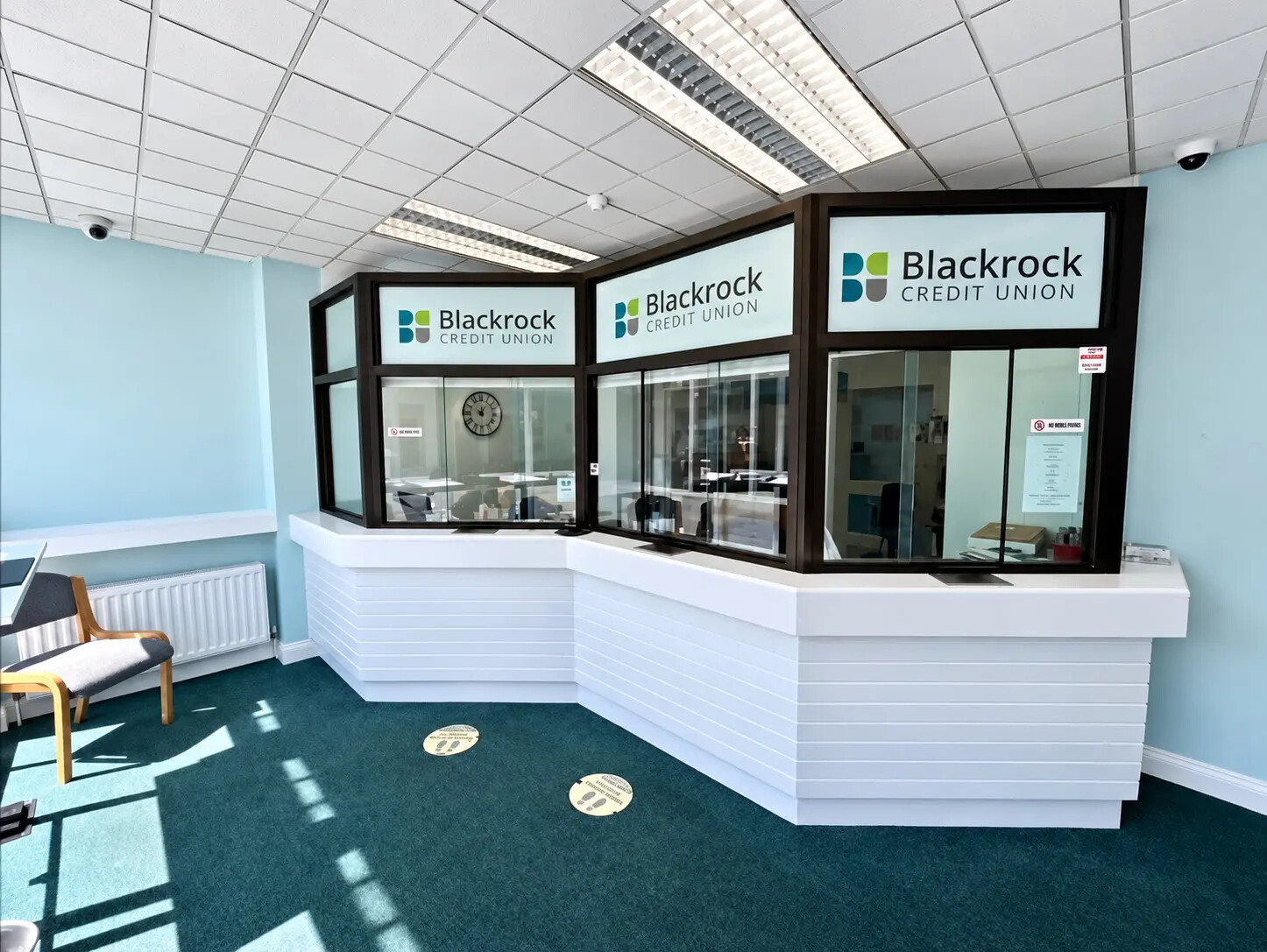 Completed customer-facing interior with painted walls and joinery