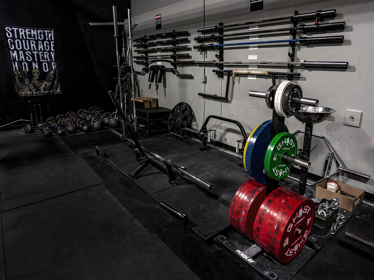 Specialty bars and plate-loaded machines at Norse Compound in Concord, NC