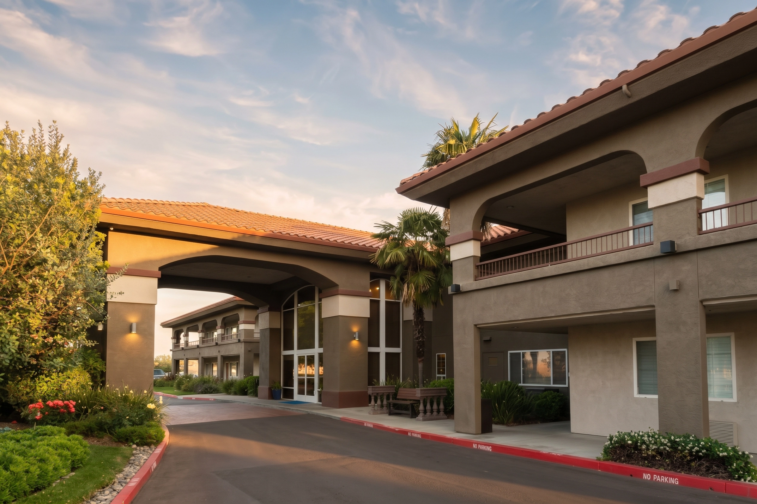 Baymont Inn and Suites Modesto, refreshed classic California motor inn at dusk