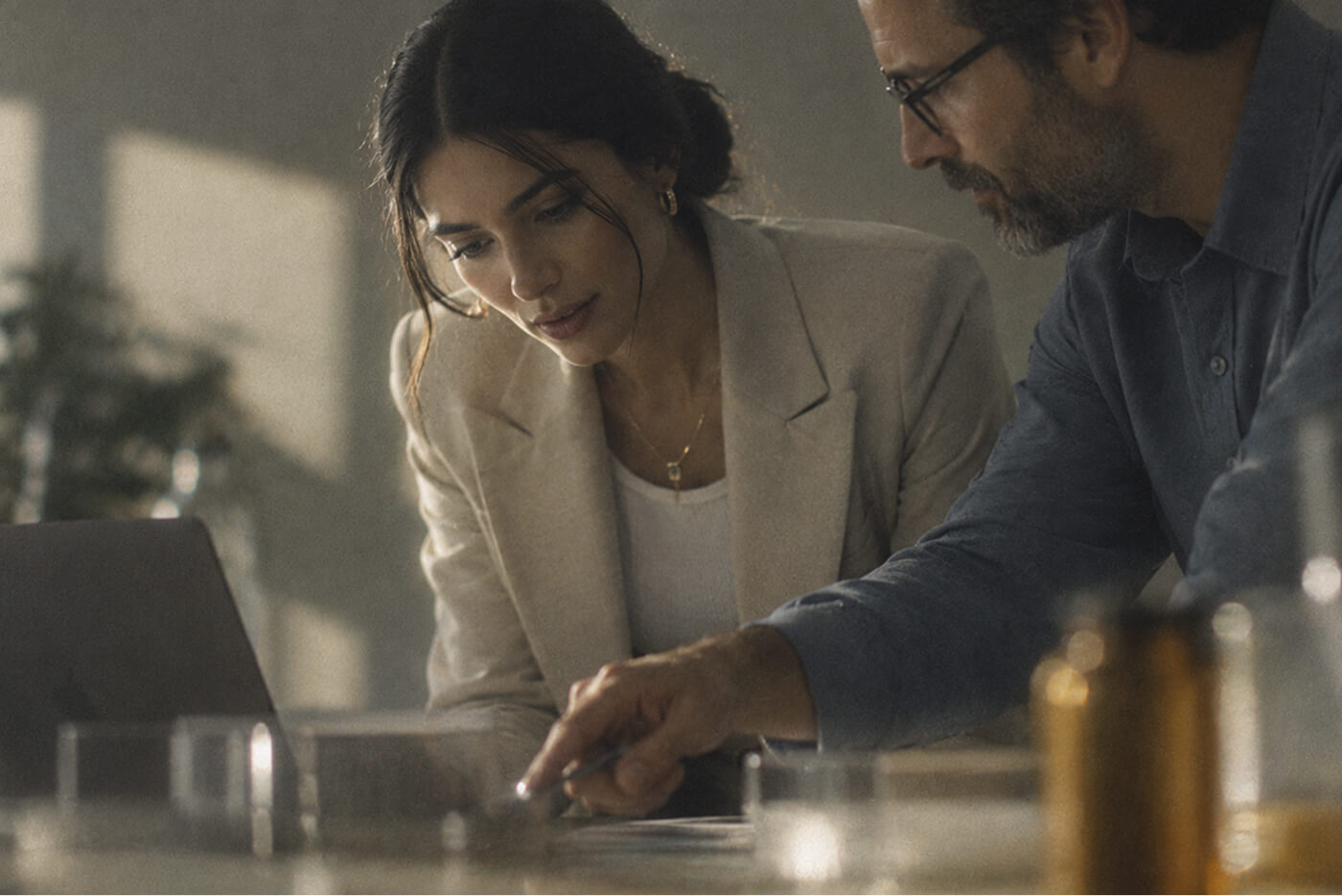 Two Avyron colleagues reviewing documents together