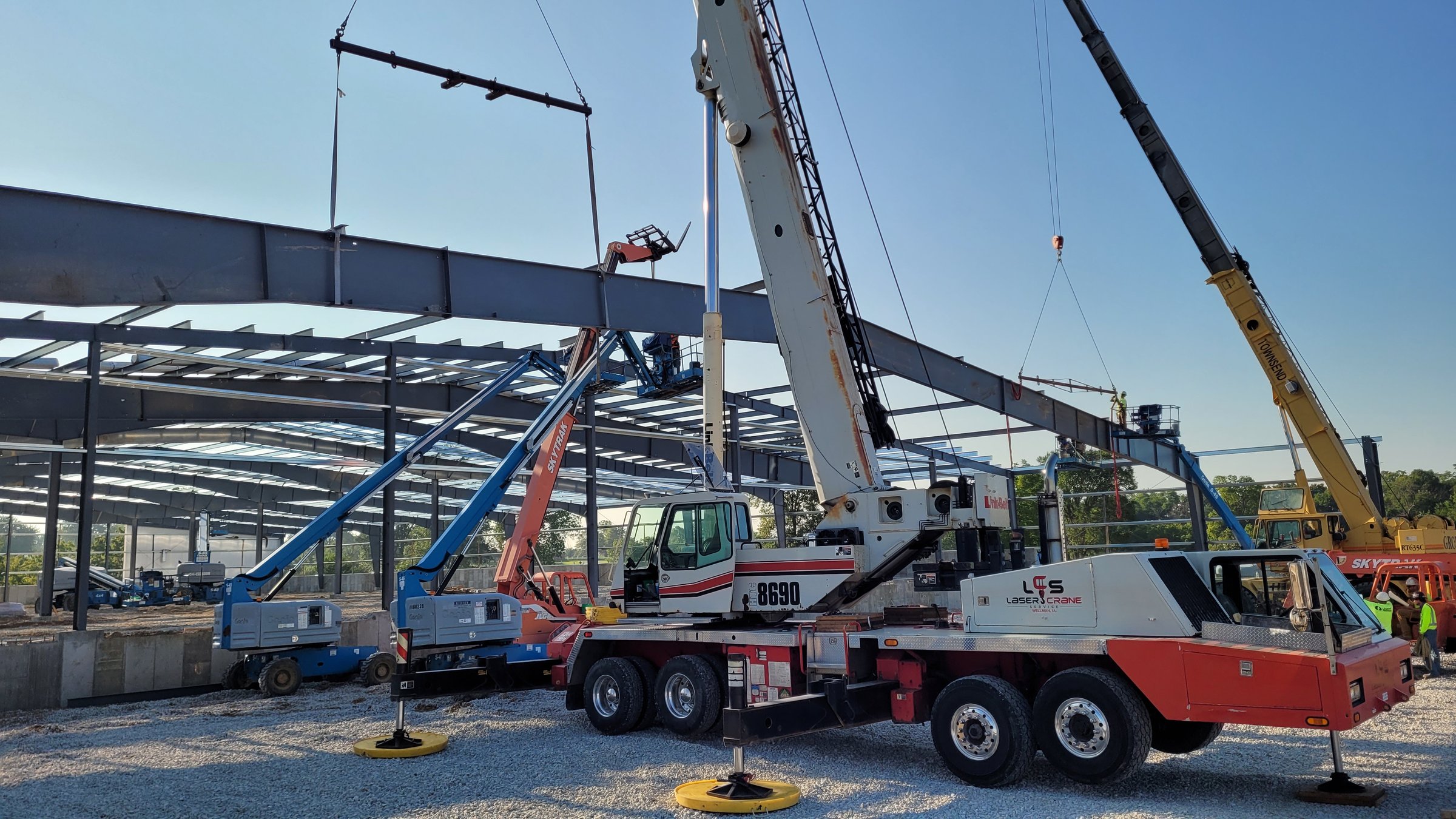 Link-Belt crane working inside a steel frame