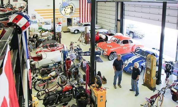 Classic cars, motorcycles and memorabilia in an owner's garage