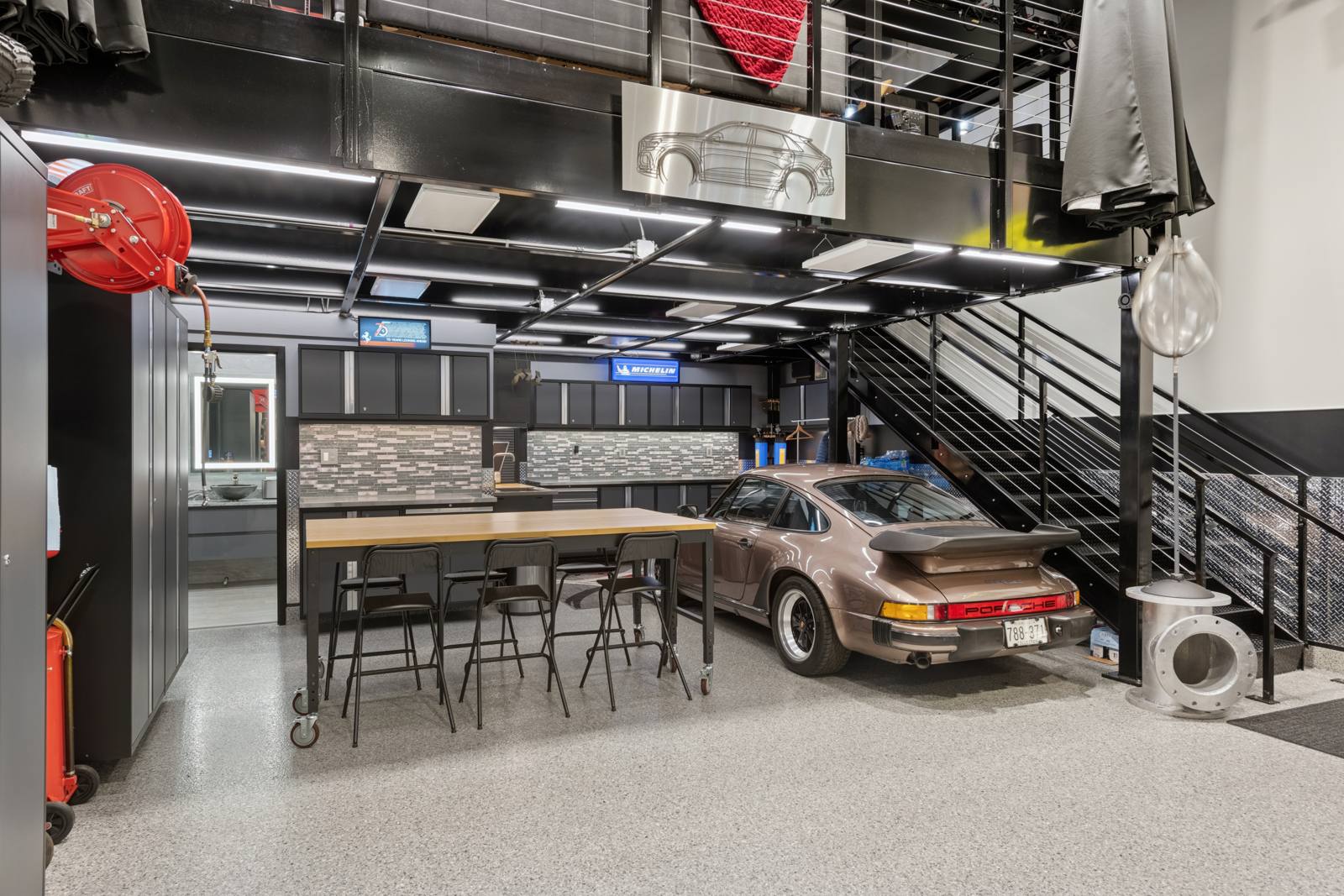 Mezzanine lounge above a finished garage