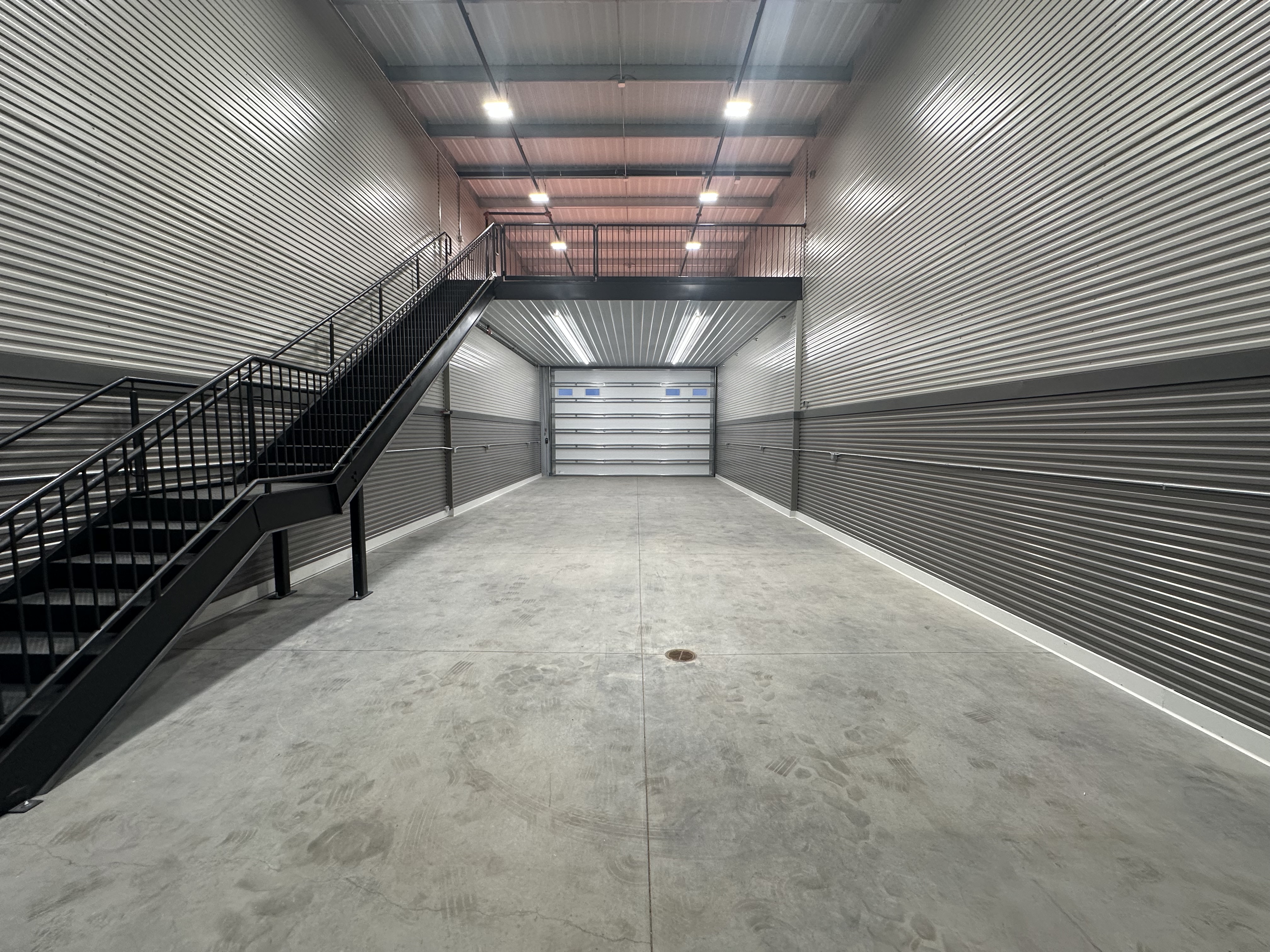 Standard 24x70 Woodbury interior with mezzanine and stairs