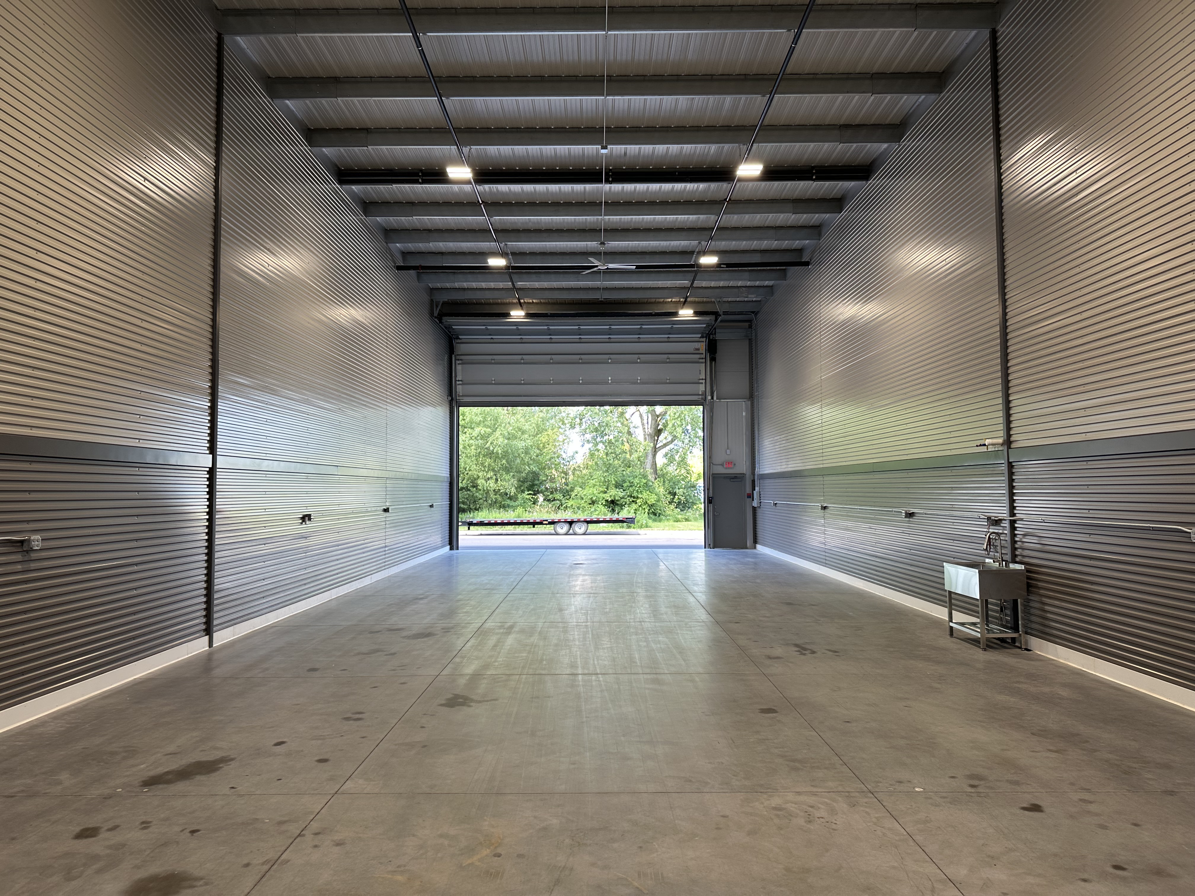 Standard 30x100 Prior Lake interior facing overhead door with sink
