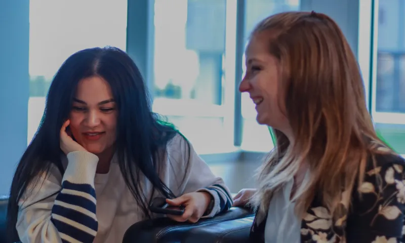 Two colleagues talking in the office