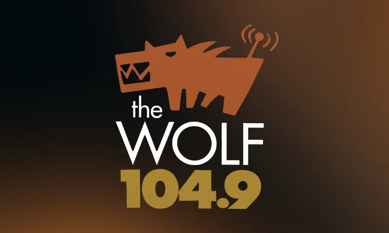 104.9 the WOLF logo