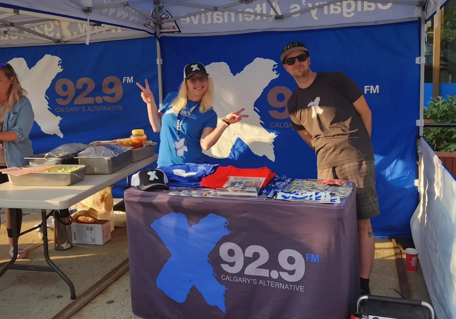 Two hosts broadcasting from the X92.9
