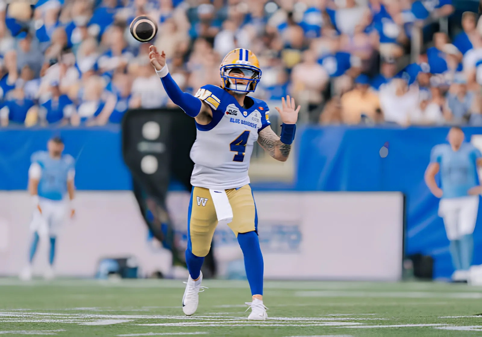 Quarterback throwing