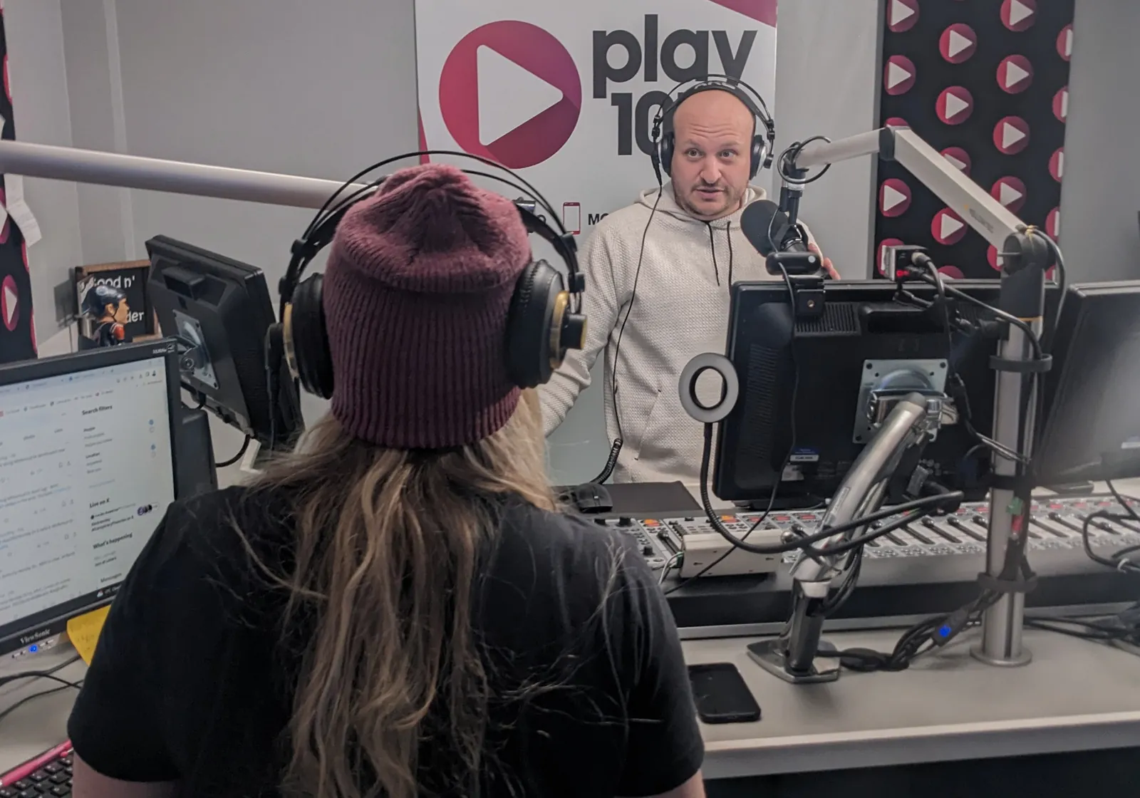 play 107 hosts on air in the studio