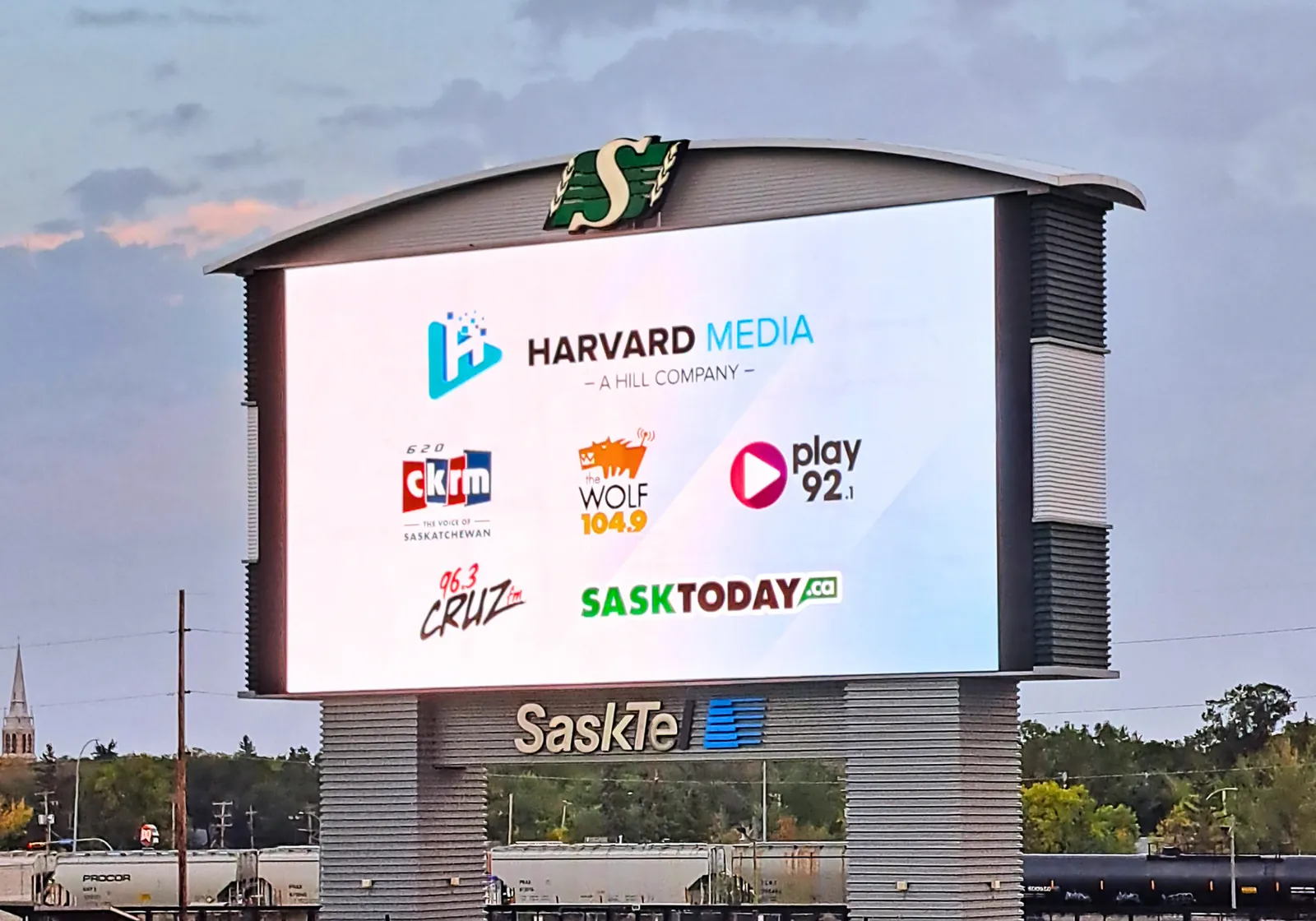 Harvard Media brands on the Mosaic Stadium billboard