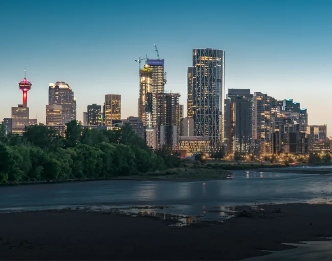 Calgary skyline at dusk across the river