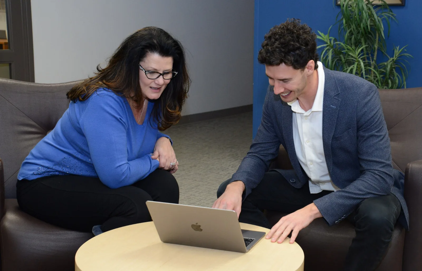 Two colleagues reviewing a campaign