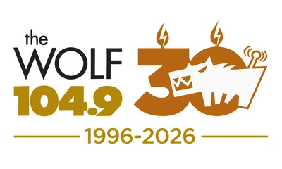 104.9 the WOLF logo