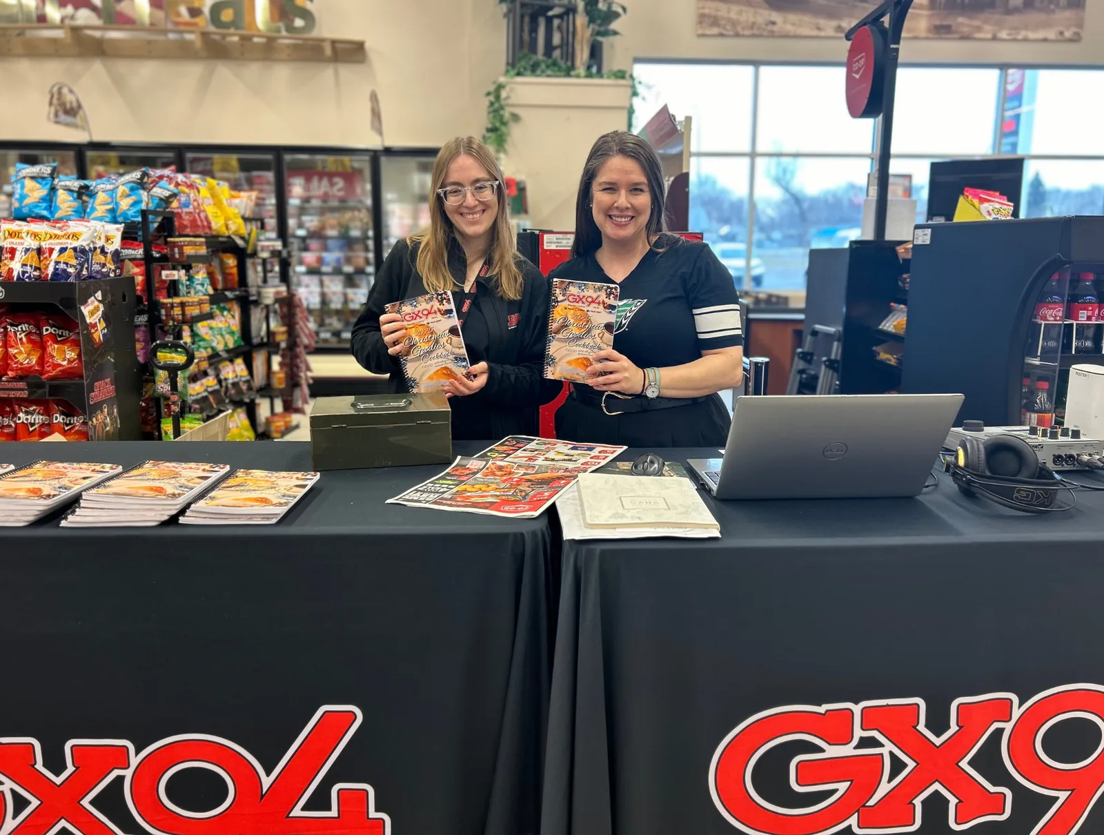 GX94 team at a promotional table