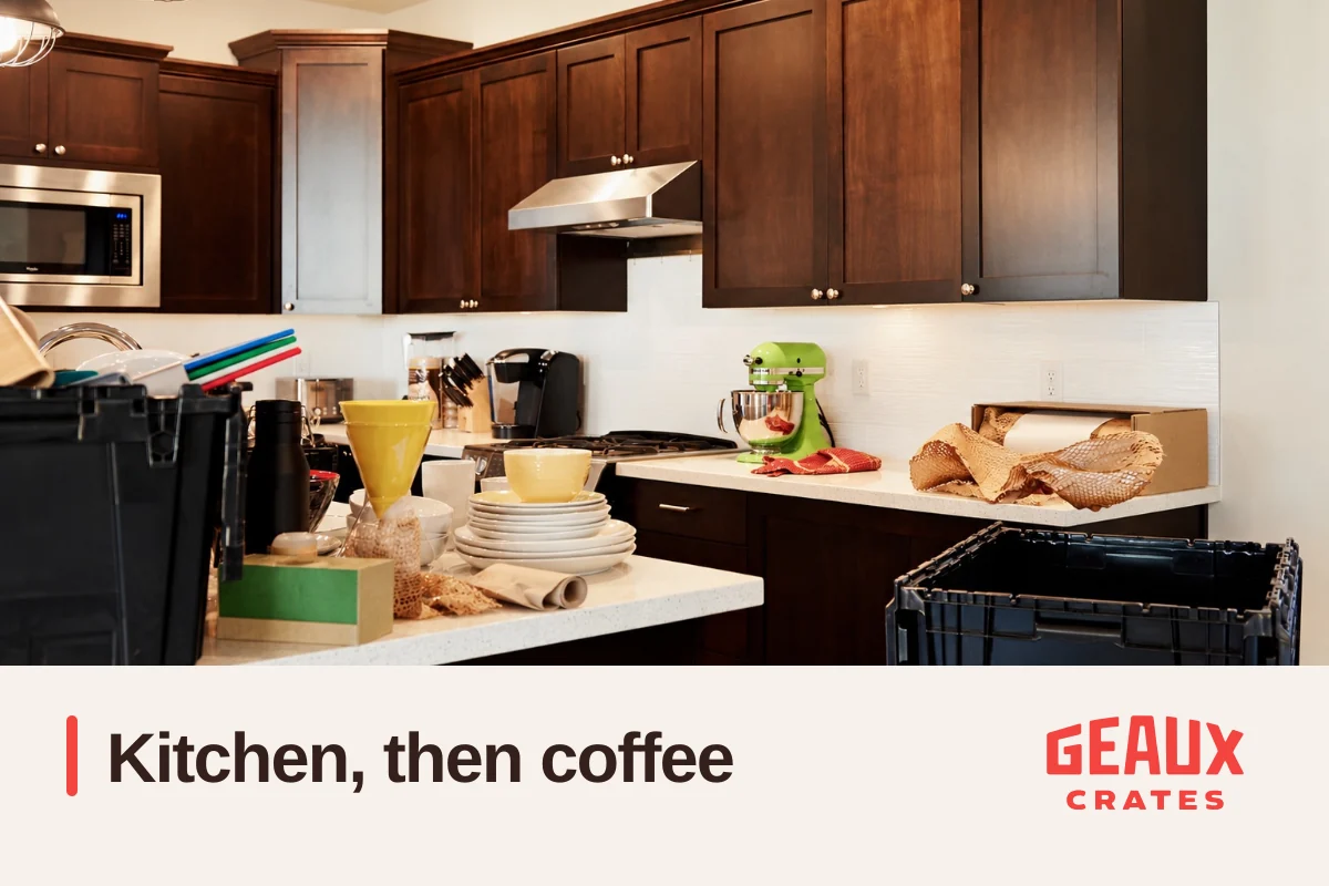 Kitchen counters with dishes, wrapping paper, and real crates, with “Kitchen, then coffee” and the Geaux Crates logo.