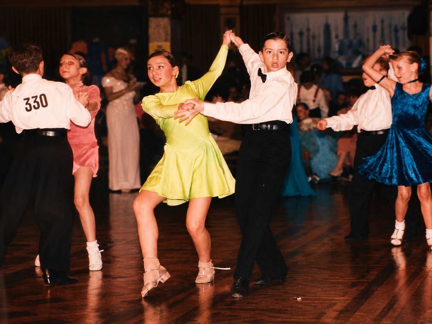 Youth students dancing at a ballroom competition