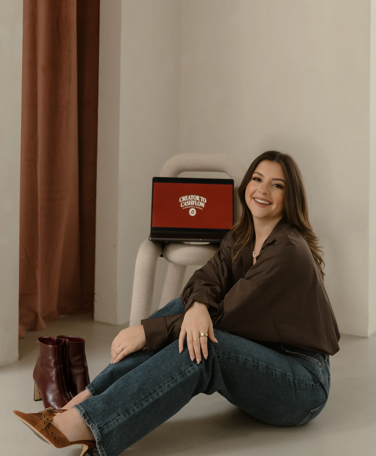 Giulia Guerrieri with the Creator to Cashflow laptop