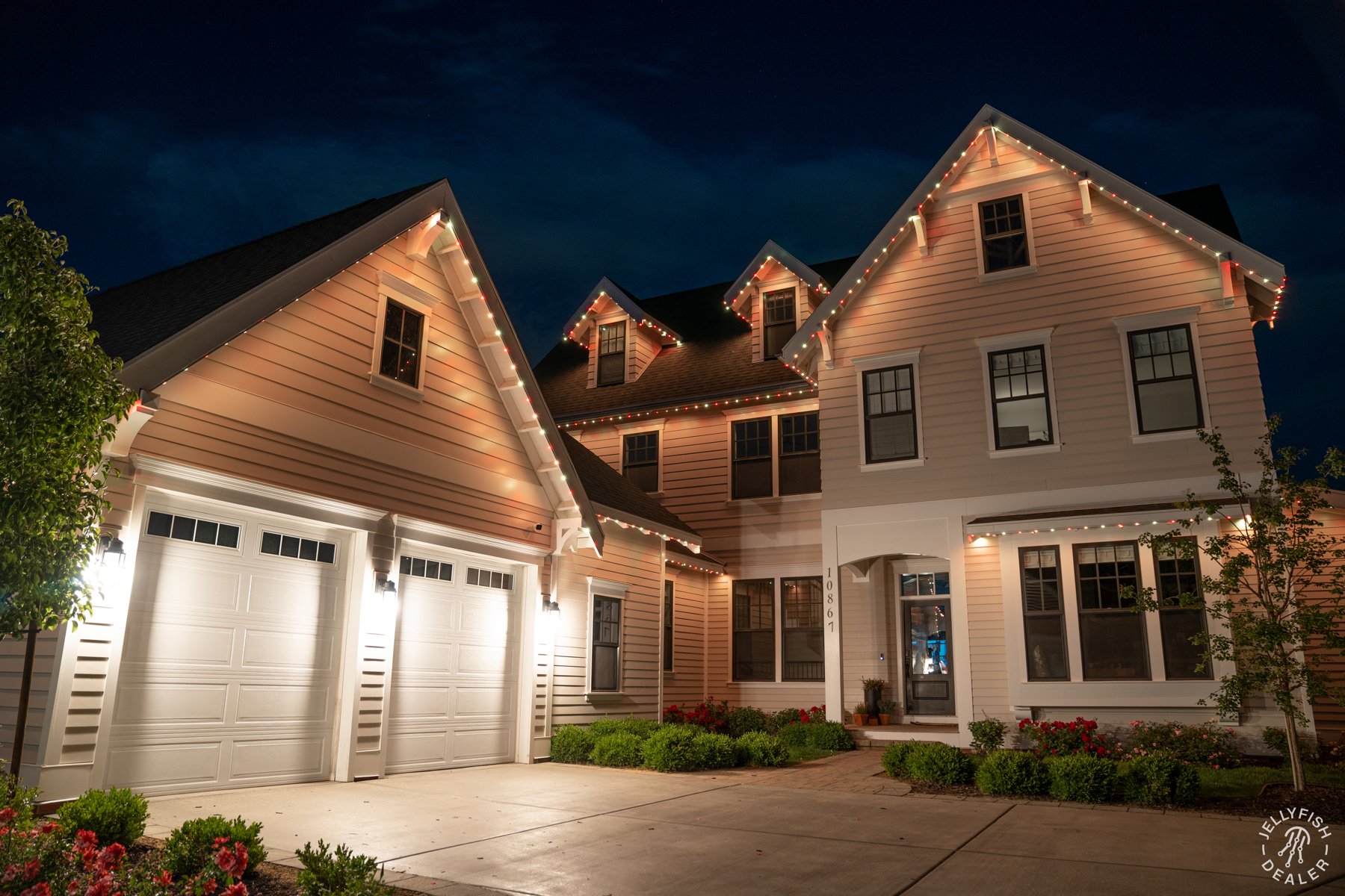 Warm golden lighting on a coastal-style home.