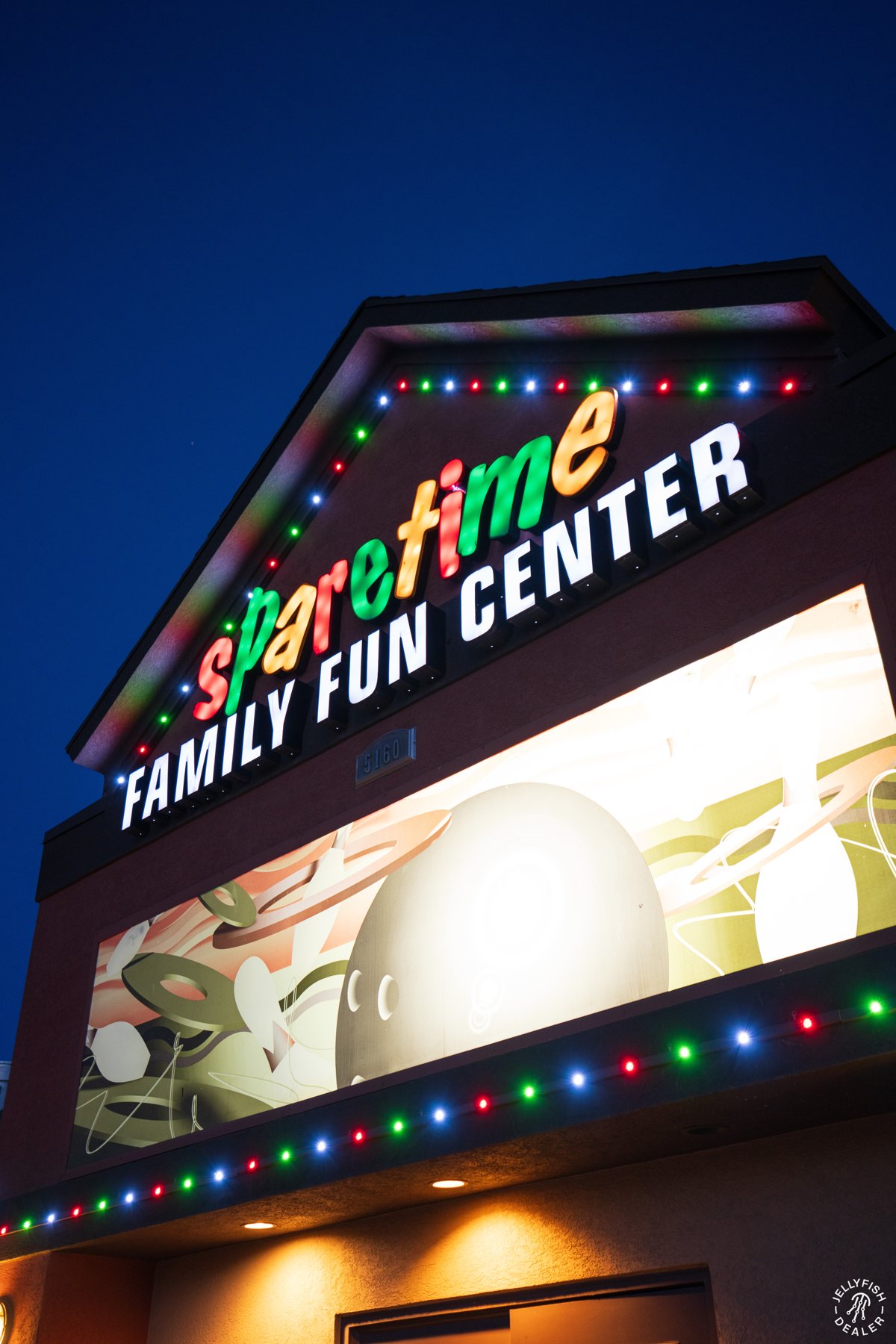 Colorful exterior lighting at a family entertainment center.