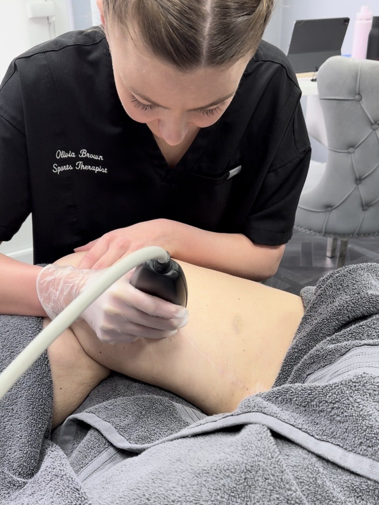 Olivia Brown giving a LymphaTouch treatment