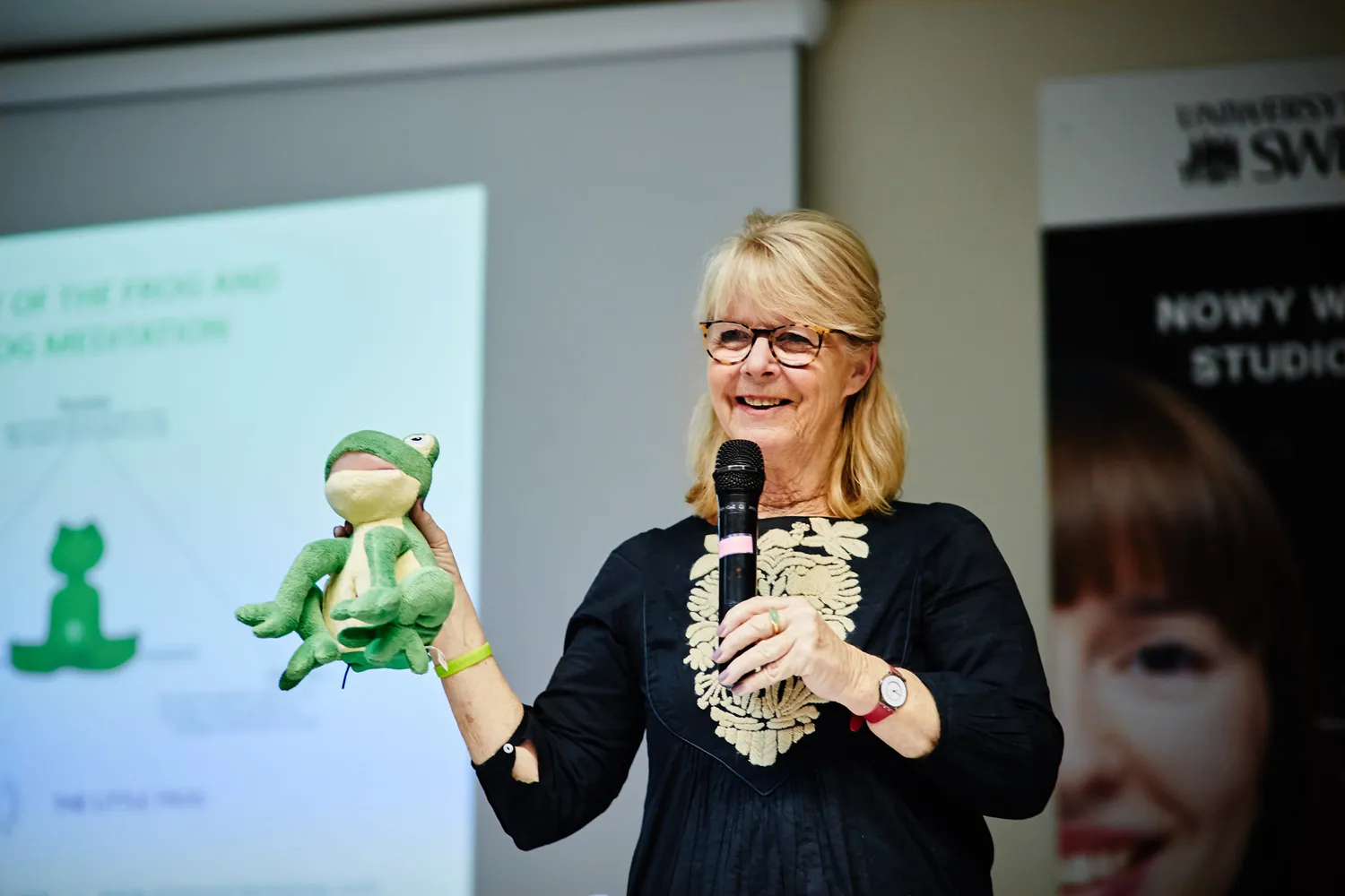 A trainer working with a class