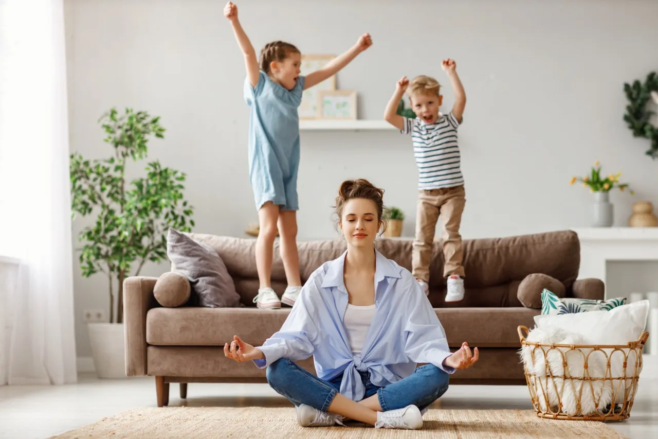 An employee at home with their child
