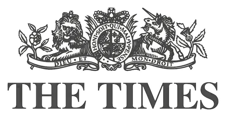 Logo of The Times newspaper showing a lion on the left, a unicorn on the right, and a crowned shield with the motto 'Honi soit qui mal y pense' in the center, with a banner bearing 'Dieu et mon droit' below.