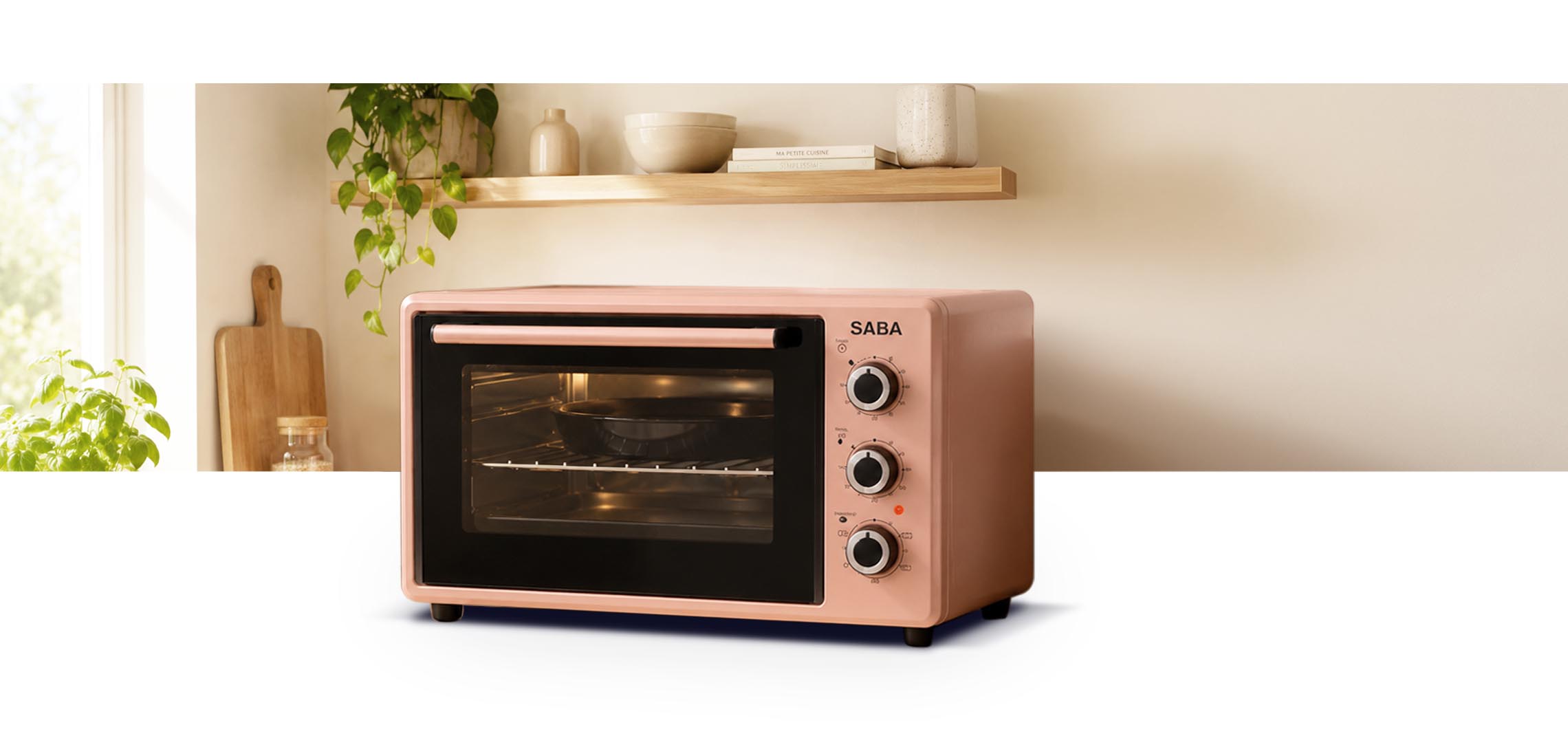 SABA 35L electric oven in rose gold on a kitchen worktop