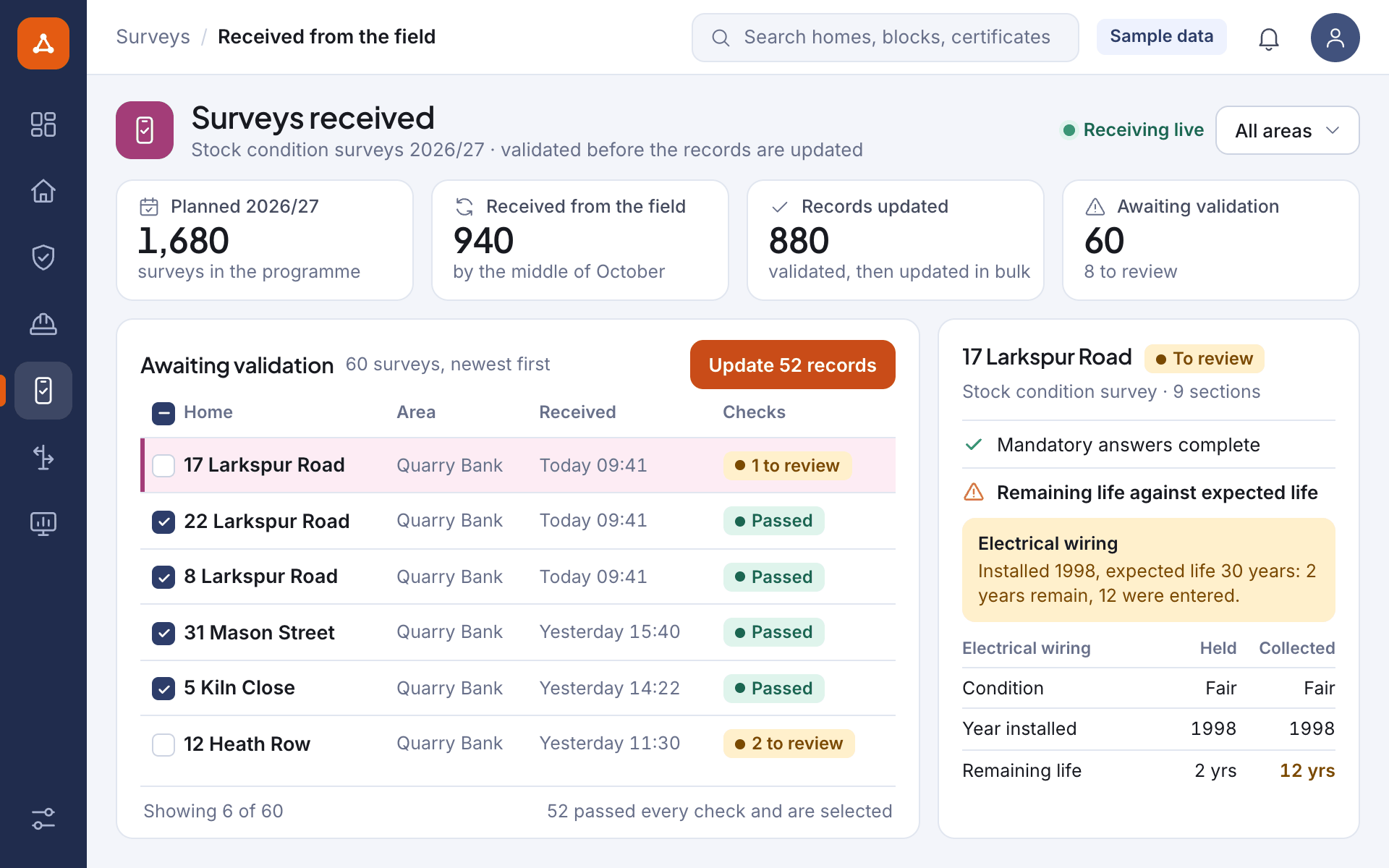 Illustrative screen: the office view of surveys received from the field, with the checks each survey passed or failed, one survey to review and the records to update in bulk, for a sample portfolio