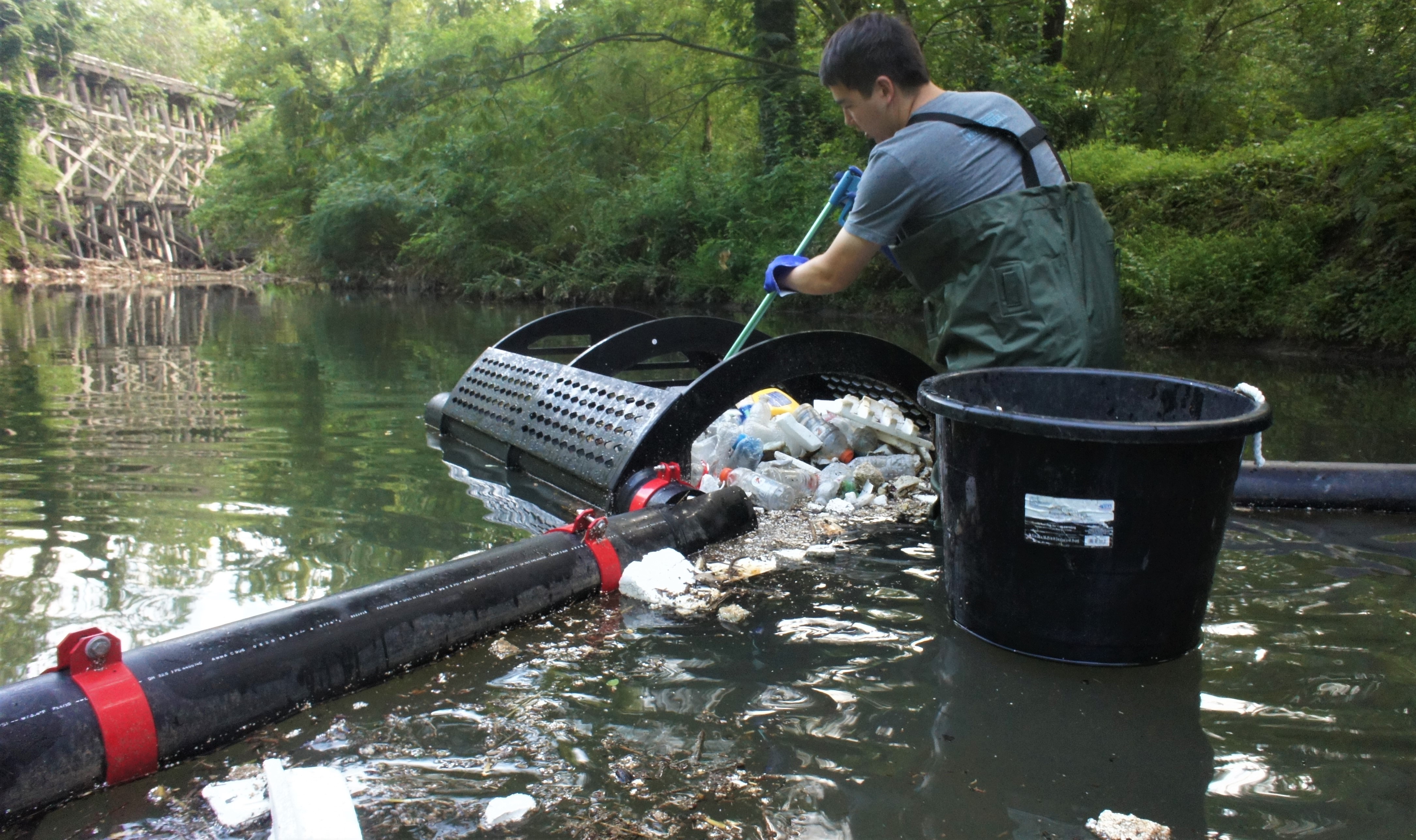 Chattahoochee Riverkeepers cleaning a Bandalong Bandit in Ardmore Park, Atlanta, Georgia. This collaboration highlights community involvement in environmental cleanup.