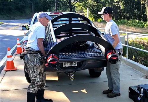 Lightweight and portable Bandalong Bandit fitting easily into a pickup truck. This image shows the ease of transport and setup for various locations.