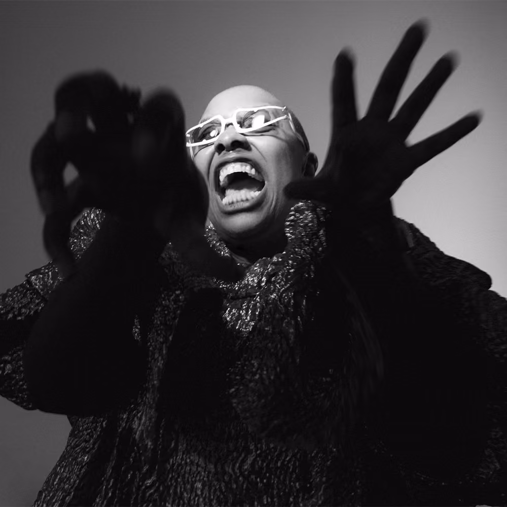 Cecile McLorin singing in back and white