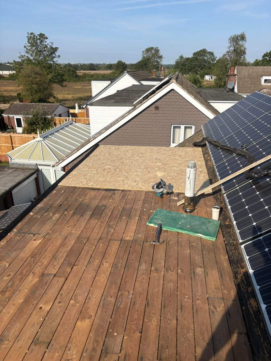 During: the roof surface being prepared