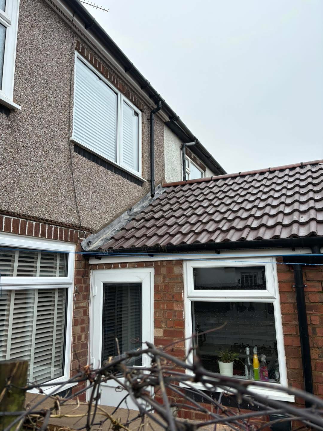 After: the completed tiled roof