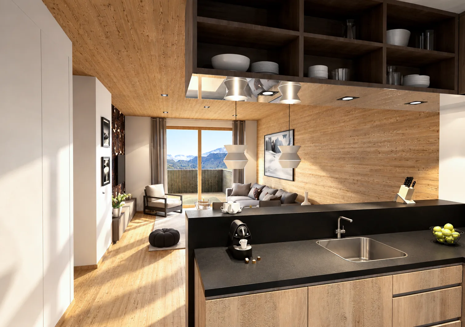 Cuisine ouverte avec plan de travail noir, façades en bois clair et vue sur les montagnes depuis le séjour.