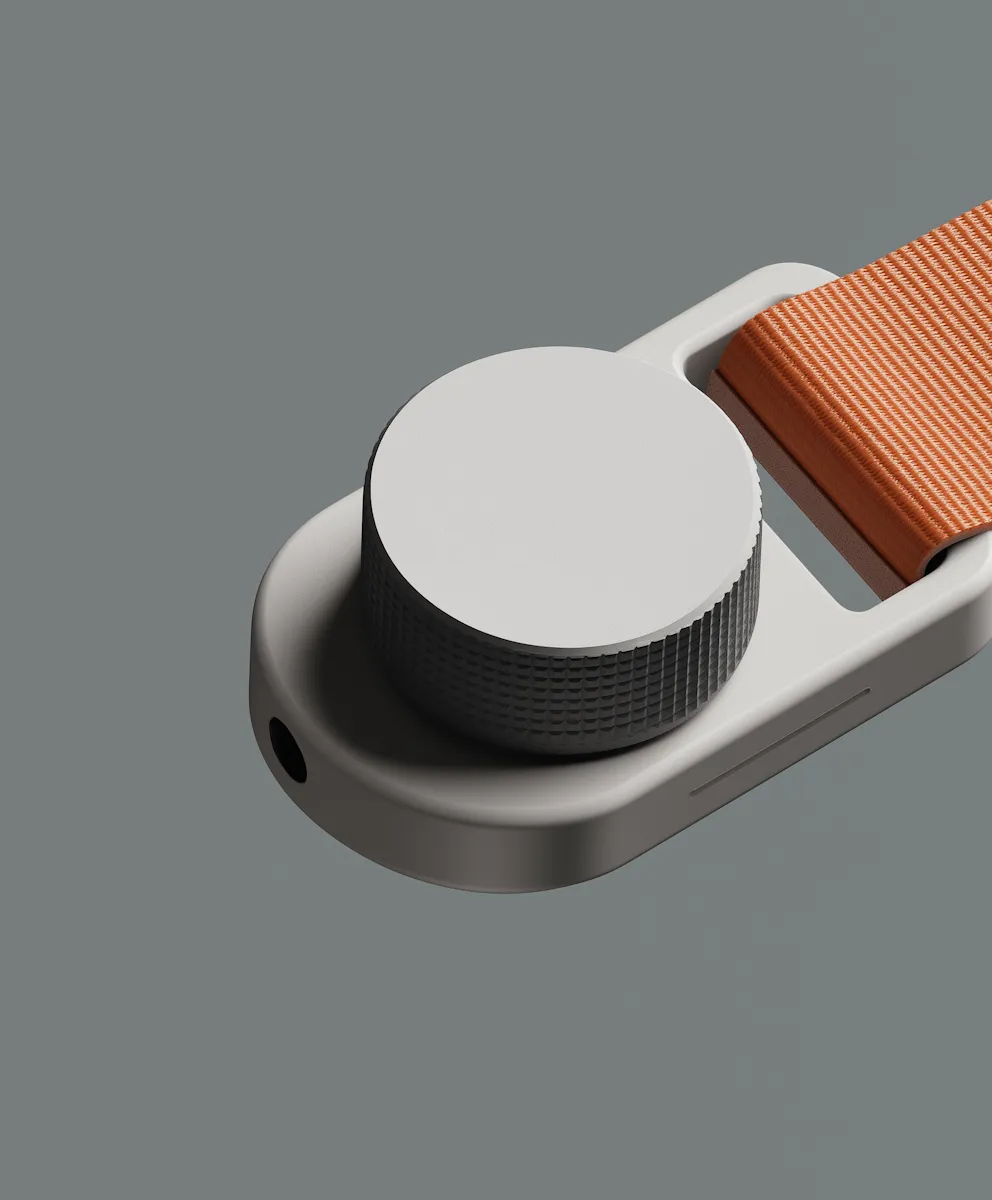 Close-up of a modern smartwatch with a large, textured dial and an orange fabric strap on a gray background.