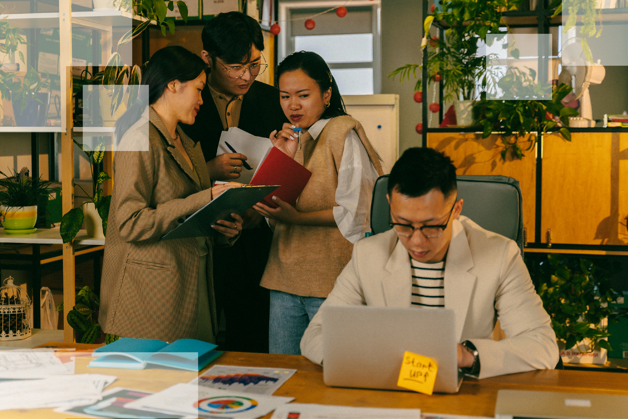 Finance team reviewing month-end close documents together