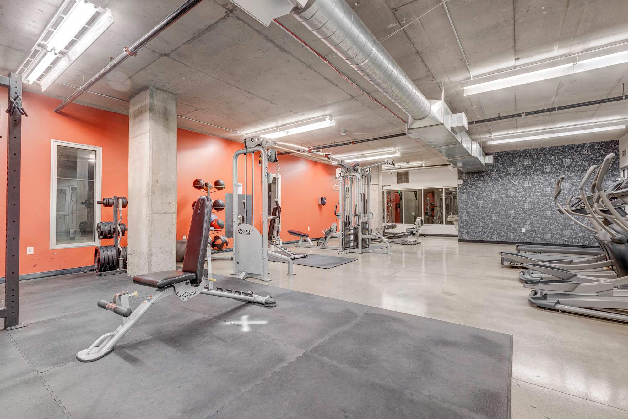 The Essex: Fitness center with strength equipment